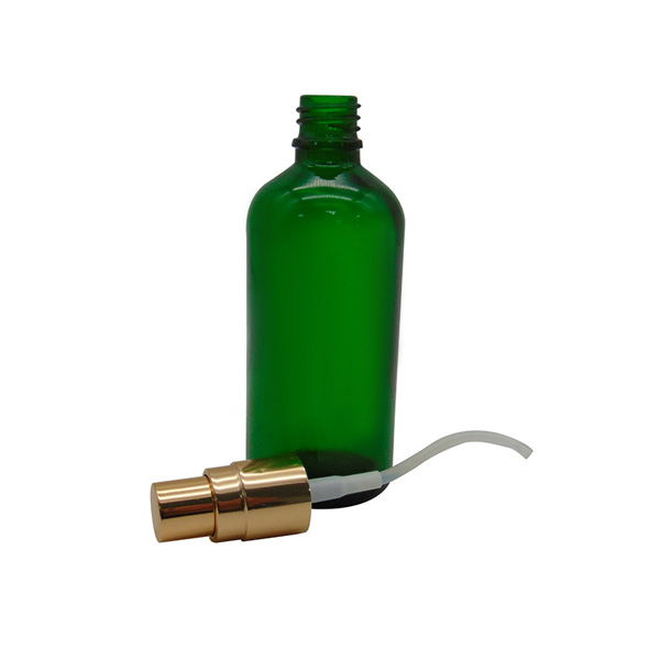 glass bottle with lid essential oil green