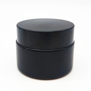 black glass jar with black lid