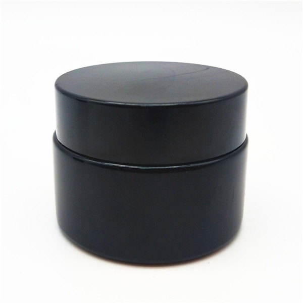 black glass jar with black lid