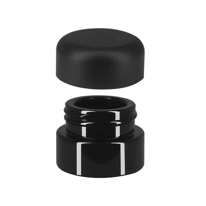 concentrate black glass jar