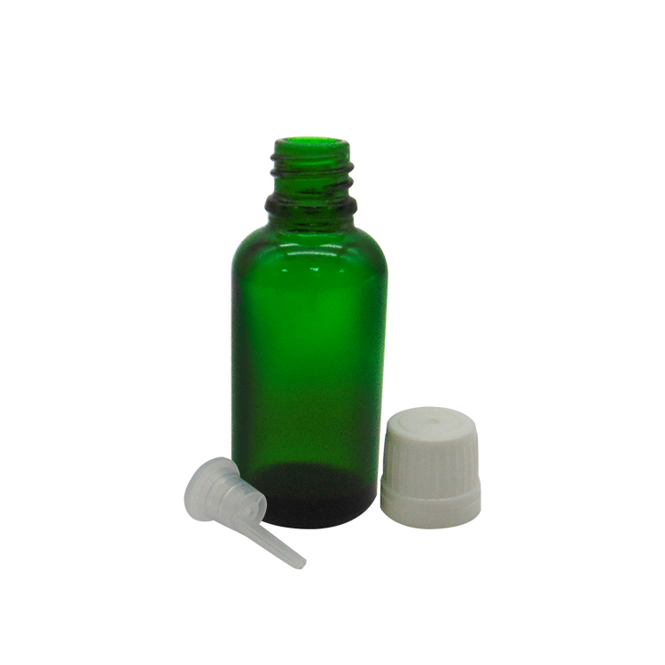 glass essential oil bottle green
