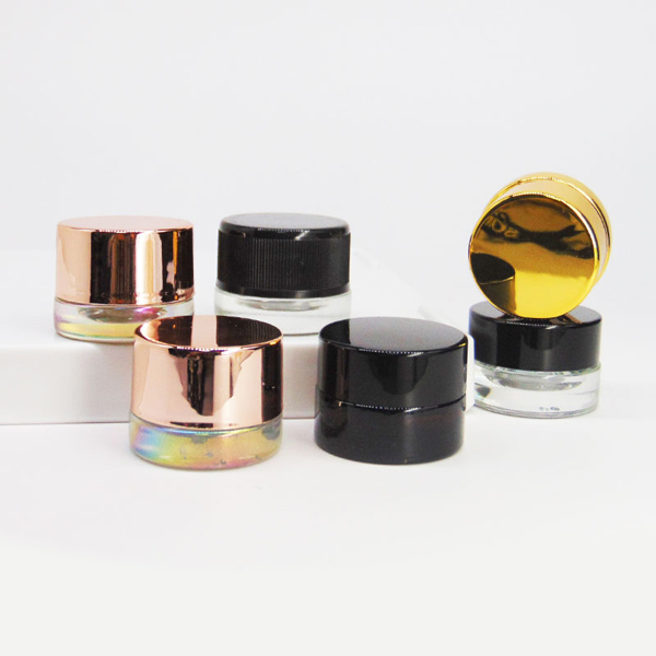 Q1: What is the capacity of this Glass Concentrate Jar? A: This jar holds 3 grams of cannabis concentrates, making it ideal for shatter, rosin, wax, CBD isolates, and other concentrates.  Q2: Is the lid child-resistant? A: Yes, the jar features a secure child-resistant lid that complies with safety regulations, providing peace of mind for retailers and consumers.  Q3: What material is the jar made of? A: The jar is made from premium thick glass, ensuring durability, breakage resistance, and protection of the product’s potency and flavor.  Q4: Can the jar be customized with my brand logo? A: Absolutely. We support OEM and ODM customization, including logo printing, color options, and other branding solutions to meet your packaging needs.  Q5: Is this jar suitable for wholesale orders? A: Yes, we supply this Glass Concentrate Jar in bulk, making it perfect for distributors, retailers, and cannabis brands looking for high-quality packaging.  Q6: Can it store other products besides cannabis concentrates? A: Yes, it can also be used for CBD topicals, medicinal preparations, and other small-volume extracts requiring airtight, safe storage.  Q7: How durable is the jar? A: With its thick-wall glass construction, this jar is designed to withstand daily handling and transport, reducing the risk of breakage.  Q8: What makes this jar ideal for brands and dispensaries? A: Its professional and minimalistic design elevates product presentation, while the child-resistant lid ensures compliance with safety regulations.