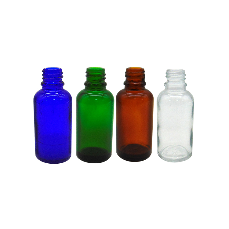 glass bottle with lid essential oil green